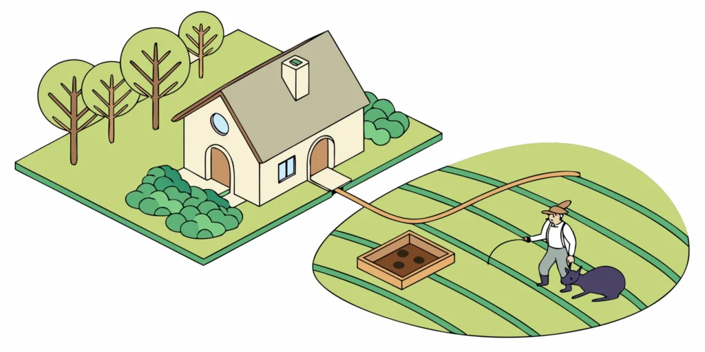 A person in their yard holding a mole caught with a trap they bought online.